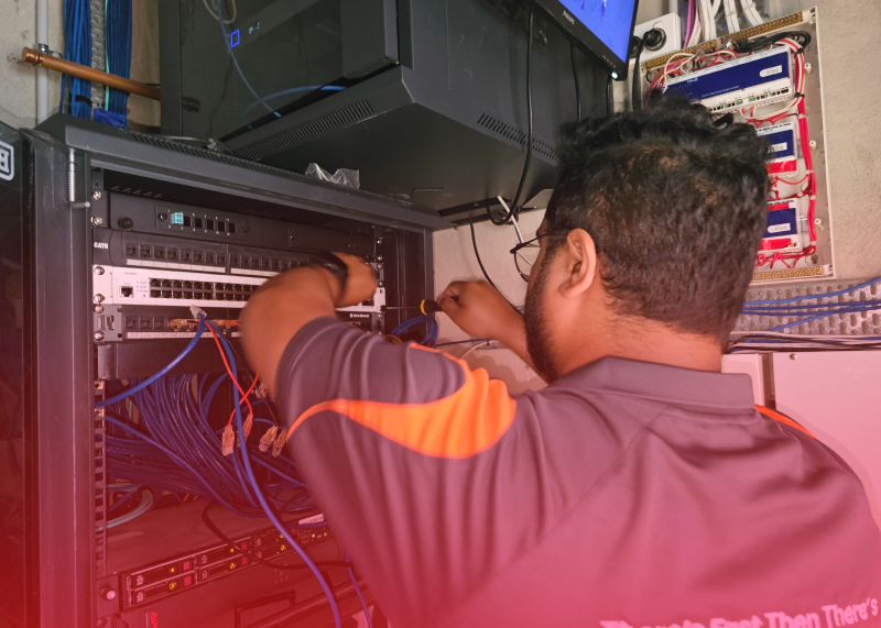 Trucell team member installing internet access point for a more secured surfing in this clinic